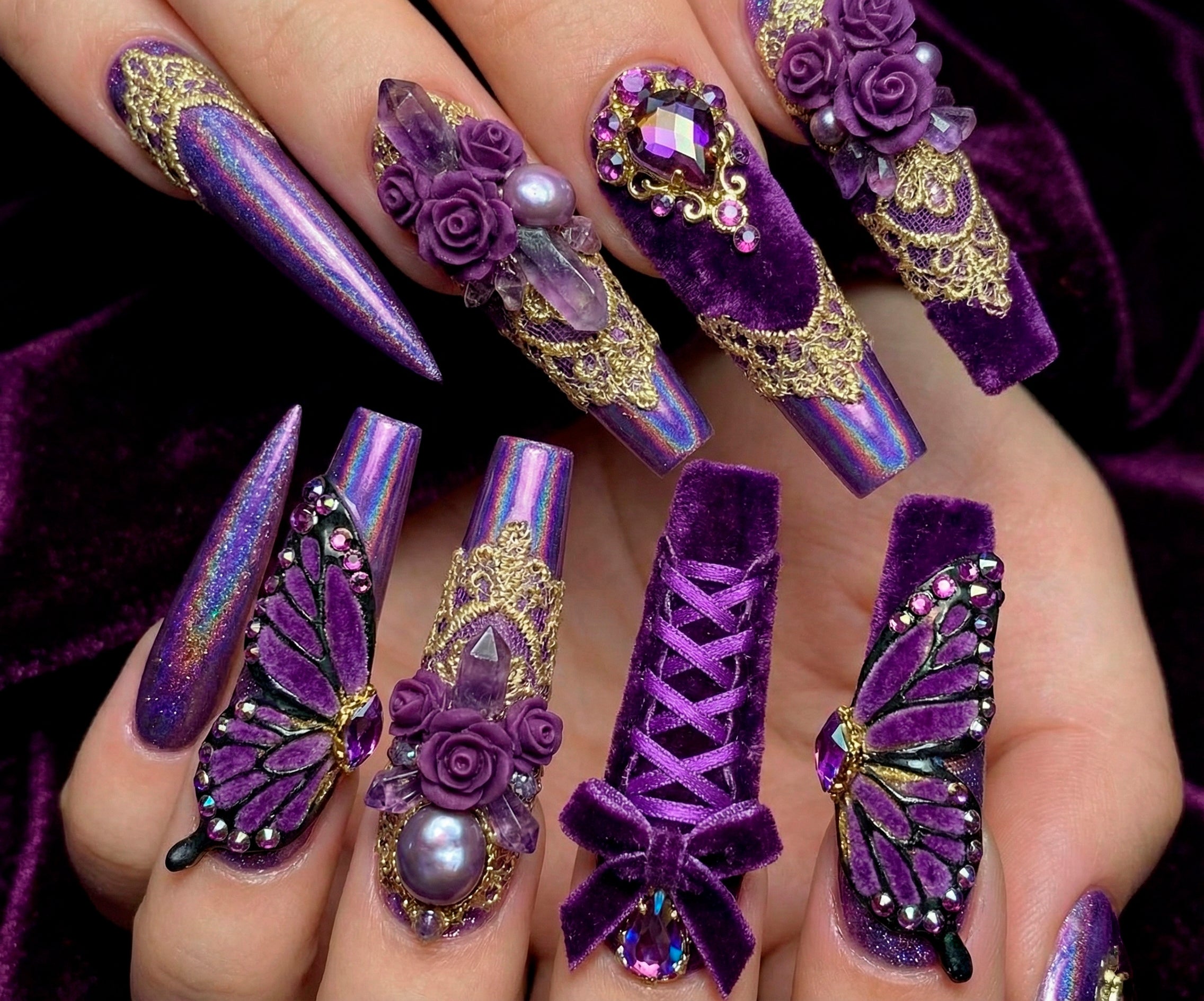 Intricate 3D floral nail art and purple velvet texture extensions created with professional jelly gel.